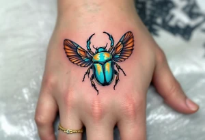 A turquoise scarab beetle with outspread copper wings, representing rebirth and transformation. tattoo idea