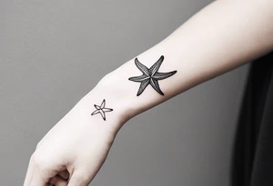 Dainty and delicate Shell/starfish wrist tattoo tattoo idea