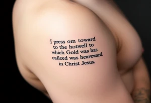 Minimalist tattoo on inner bicep. Mostly text of Philippians 3:14: I press on toward the goal to win the prize for which God has called me heavenward in Christ Jesus. Some design element tattoo idea