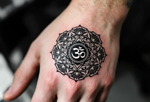 wheel of Dharmachakra with an ohm symbol in the middle tattoo idea