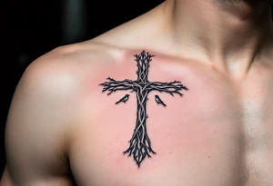 A forest-inspired Celtic cross made of intertwining tree branches, with small birds perched along its arms. tattoo idea