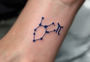 A bold constellation in sapphire ink arcs over a pale Pisces glyph, creating a celestial connection on the wrist. tattoo idea