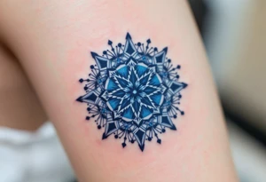 A navy blue eight-pointed star tattoo represents inner depth and personal truth. tattoo idea