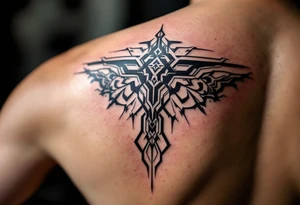 A tribal-inspired "T" in jet black with symmetrical geometric detailing. tattoo idea