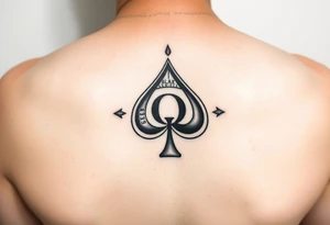 A spade womb tattoo with a Q in the center, with three points around the outside. The first reading, "BLACK". The second reading, "SEED". The third reading, "ONLY". tattoo idea