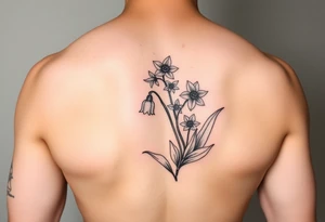 Coquis, stamp with daffodils, Lily of the valley, larkspur tattoo idea