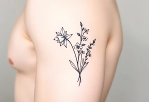 Feminine daffodils, Lily of the valley and larkspur bouquet tattoo idea