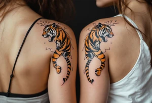 Matching couple orange and black tiger stripes wrapping around both partners upper arms tattoo idea