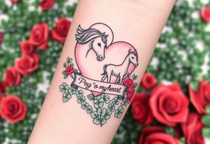a big pale pink heart and a mare with wings and a halo and a colt in a huge patch of green shamrocks, and red roses with a banner across the heart that says Peg 'o My Heart tattoo idea
