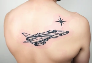 Shoulder tattoo of a spaceship and a star. tattoo idea