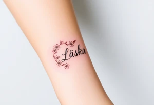 A golden infinity loop with tiny cherry blossoms surrounding the word "Láska", representing beauty, romance, and fleeting yet eternal love tattoo idea