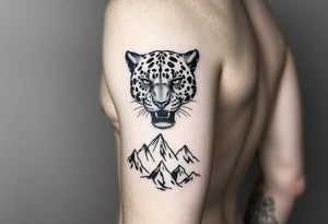 Jaguar face in the arm close to elbow mountains at the bottom close to the wrist tattoo idea