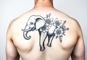 Elephant with flowers on the arm tattoo idea