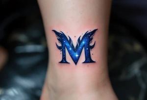 A cosmic-themed "M" in deep indigo with specks of starlight white. tattoo idea