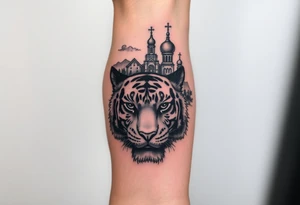 in a dorsal view of the hand and forearm a tiger face on the hand with black hollowed eyes, then above this a orthodox church shrouded with a mist and fading into a virgin mary overlooking tattoo idea