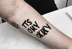 Phrase "It's okay not to be okay" on the arm below the forearm tattoo idea