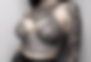 Underboob tattoo that follows the shape of the boob tattoo idea