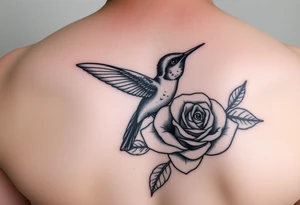 Debby Deguzman with a humming bird and a rose tattoo idea