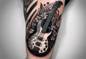 Tattoo full left arm with a collage of a bass guitar, a medicine caduceus, two stars tattoo idea