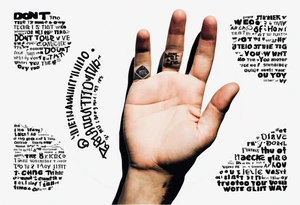 Circle of text on rhe hand with the tezt of dont waste tour time looking back youre not going that way tattoo idea
