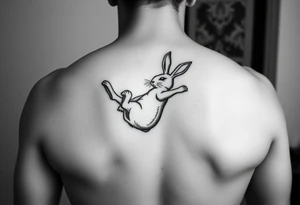 a bunny doing a back flip tattoo idea