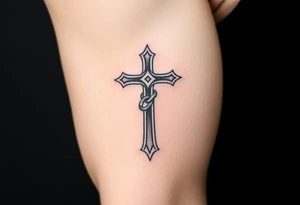 A Gothic cross entwined with chains, in silver and dark metallic tones, symbolizing pain and sacrifice tattoo idea