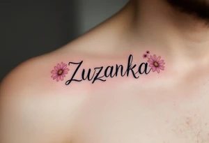 Zuzanka written in gentle cursive, nestled among pastel pink and white daisies tattoo idea