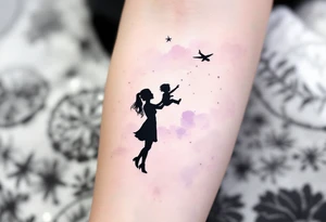 Silhouette of a mother and toddler daughter playing airplane, done in soft black with a faint watercolor wash in pale purple behind them. tattoo idea