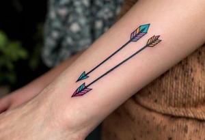 Tribal-style arrows in black with colored tips on the forearm point toward your shared journey. tattoo idea
