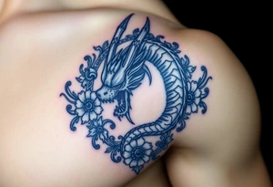 Scary dragon surrounded by ornaments tattoo idea