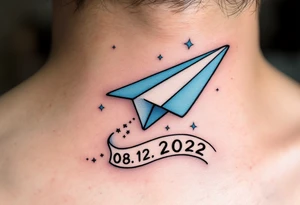 A cartoon-style paper airplane in soft grey and baby blue, trailing a banner with the birthdate 08. 12. 2022. tattoo idea