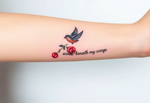 Soaring robin with trail of red rose petals with writing saying wind beneath my wings tattoo idea