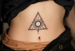 lily letter c and a rising sun triangle tattoo idea