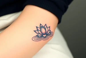 serene lotus flower emerging from sacred waters with ripples tattoo idea