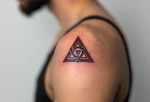 A bold triquetra, filled with deep red and black patterns tattoo idea