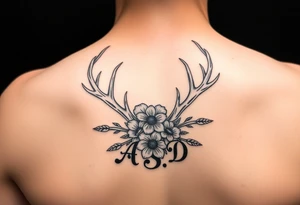 Deer antlers with flower and initials A, S, D tattoo idea
