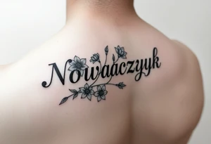 The word "Nowaczyk" with three flowers on the lower tricep tattoo idea