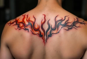 Matching red and orange flame tattoos on one partners shoulder and on second partner shoulder tattoo idea