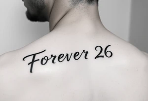 forever 26 in scripted writing tattoo idea