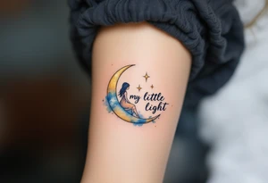 A crescent moon and small star in gold and soft blue with little girl sitting on the Moon “My Little Light” in flowing script. tattoo idea