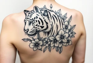 a whole tiger with some flowers around it tattoo idea