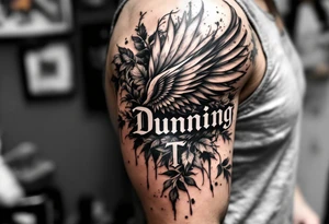 Dunning,on left arm details include angel wing, greek type of font,jungle leaves , tiger claw scratch tattoo idea