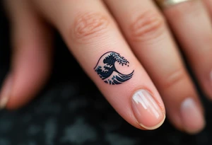 A tiny black wave with delicate shading curls on the side of the finger, simple and elegant. tattoo idea
