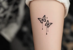 Two butterflyes with blood driping tattoo idea