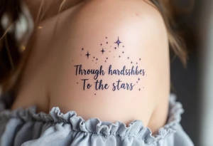 A soft gray script of “Through hardships To the stars” stretches beneath a pale lavender constellation on the shoulder blade. tattoo idea