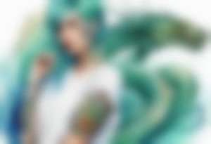 a sea serpent next to a women with blue-green hair wearing a white tunic tattoo idea