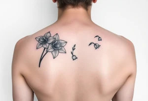 shoulder blade tattoo for women with daffodils, daisy, lily of the valley tattoo idea