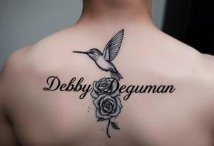 A tattoo with the name Debby Deguzman with a humming bird and a rose tattoo idea