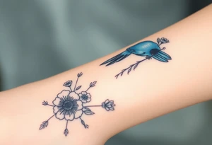 powerful majestic bluebird surrounded by wild flowers tattoo idea