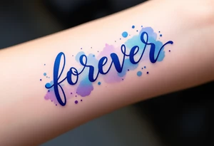 A watercolor-style "forever" in splashes of blue and purple, surrounded by paintbrush strokes. tattoo idea